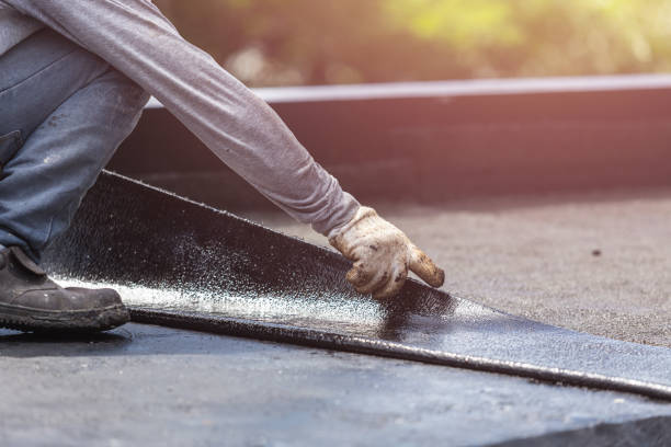 Professional Exterior Waterproofing technician working in Jackson, AL